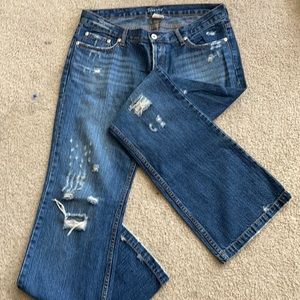 Distress button fly jeans